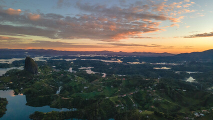 Natural panoramic view of the Peñol Antioquia dam, aerial shots with a drone, sunrise view