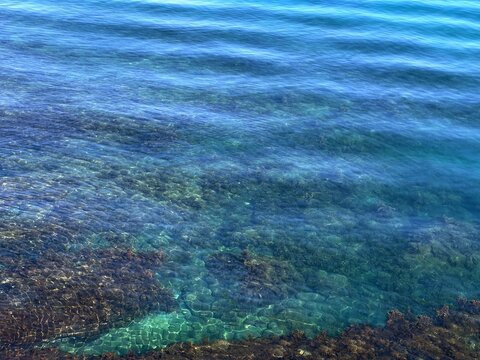 Blue sea water with ripples aerial view.