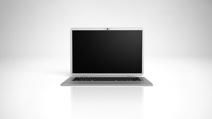 silver laptop lies on a white background