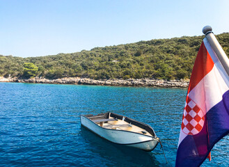 Small Boat Dinghy on the Calm Blue Sea - Croatia Flag, Summer Travel Island