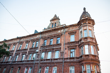 Fototapeta premium Old red brick multi-storey European building 