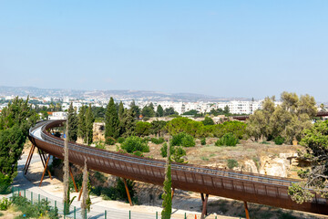 Metal pedestrian bridge. Paphos, Cyprus. The footbridge leads to the ruins of the city.