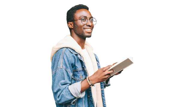 Portrait Of Smiling Young African Man Student With Book Looking Away Wearing Eyeglasses Isolated On White Background