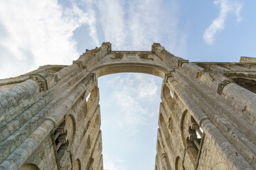 looking up to the arch of the Abbey ruin of the monastery Jumieges, Normandy, France