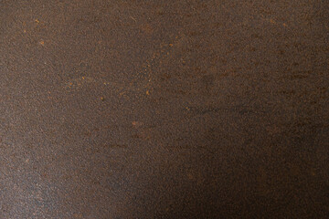Fototapeta na wymiar Reddish aged metal texture. Some grooves and fine details in the form of dots