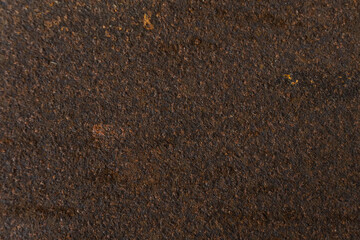 Reddish aged metal texture. Some grooves and fine details in the form of dots