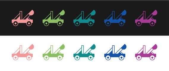 Set Old medieval wooden catapult shooting stones icon isolated on black and white background. Vector