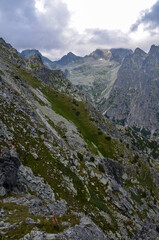 Fototapeta na wymiar Mountain landscape in Slovakia, rocky mountain valley and climbing rocks with cloudy sky in the national park High Tatras