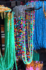 Necklaces, beads and souvenirs on display at a street market in Antalya, Turkey