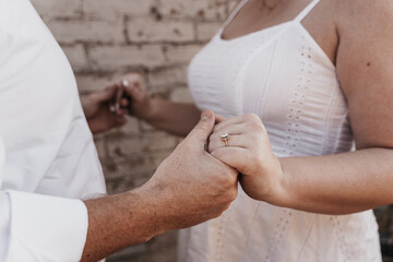 Couple holding hands