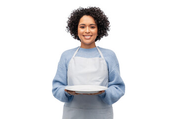 cooking, culinary and people concept - happy smiling woman in apron holding empty plate over white...