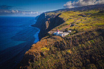 Farol da Ponta do Pargo Ilha da Madeira. Lighthouse Ponta do Pargo - Madeira Portugal - travel background. Aerial drone picture. October 2021