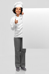 cooking, advertisement and people concept - happy smiling female chef in toque with white board over grey background