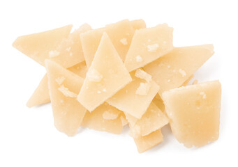 Pile of parmesan cheese pieces on white background, top view