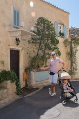 Fototapeta na wymiar France Italy French Italian Village European Summer Father Son