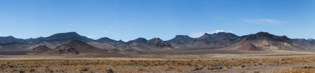 Fototapeta na wymiar American Mountain Landscape in the desert. Sunny Cloudy Sky. Nevada, United States of America. Nature Background Panorama