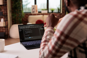 Diverse freelance coders programming html script at home, using encryption and program code to develop new user interface. Learning online app security firewall on terminal window, coding server.