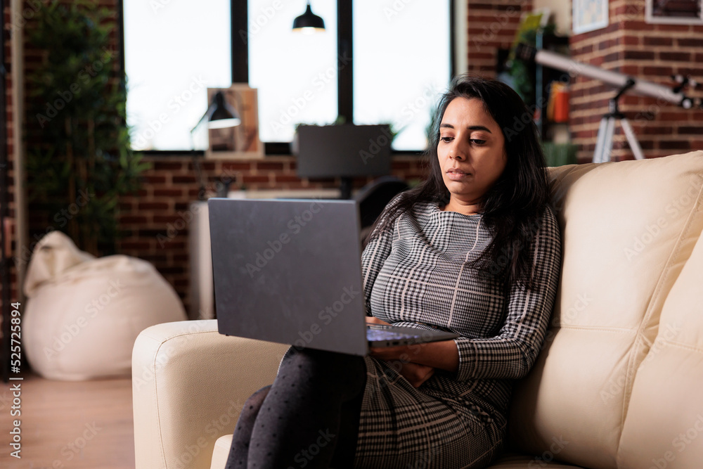 Poster female freelancer working on laptop at home, attending online class lesson or doing remote business 