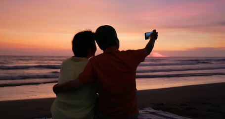 elderly couple take selfie