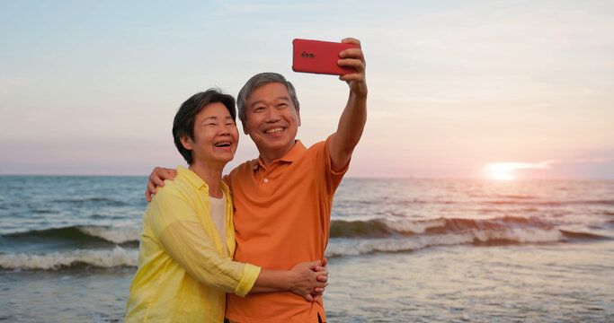 elderly couple take selfie