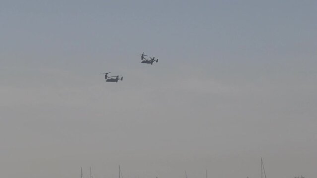 v22 ospreys fly over beach 
