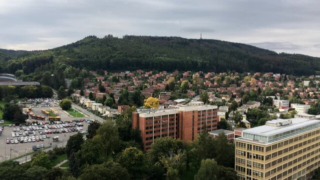Zlin town and Bata houses estates built on a hill in panning shot
