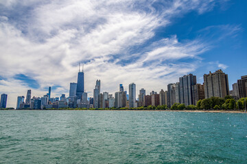 Fototapeta na wymiar Skyline view of Chicago across the water of Lake Michigan