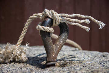 Bolt Anchor Eye Threaded Inside The Beach Rock For Tying The Boats With The Twisted Rope