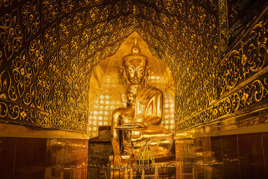 golden buddha statue at Shin Pin Shwe Sut Thwar pagoda Myingyan Manadalay Myanmar