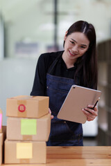 Starting Small business entrepreneur SME freelance Asian working at home