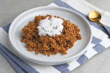 Tiwul, a traditional Indonesian food, is a staple food substitute for rice made from cassava....