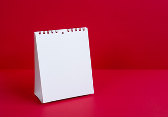 A calendar or a bulletin board on red background. In addition, it can be used for frames, notepads,...