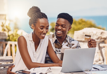 Happy couple online shopping with laptop and credit card payment on ecommerce website with a smile during vacation. Man and woman buy on the internet or pay bills, tax and finance while in summer