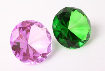 Purple and green diamond on white background