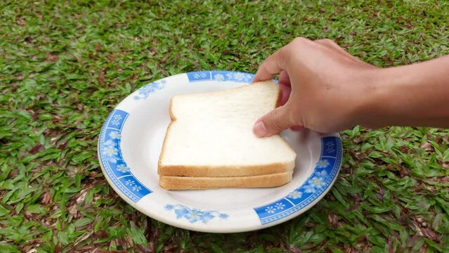 Pouring chocolate milk on doble bread, Delicious breakfast or snack