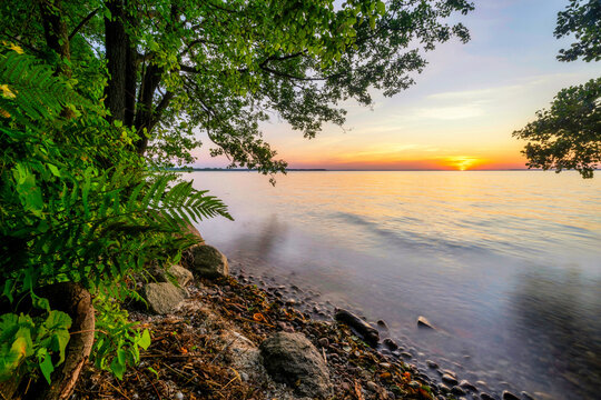 Beautiful summer sunrise over lake