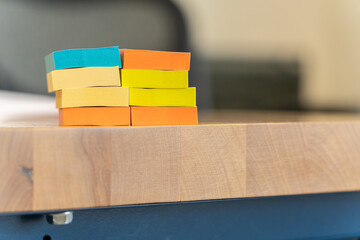 pile of sticky notes on office table at work