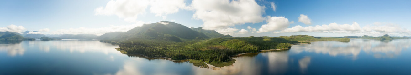 Fototapeta na wymiar Aerial Panoramic View of Kennedy Lake during a vibrant sunny day. Located on the West Coast of Vancouver Island near Tofino and Ucluelet, British Columbia, Canada.