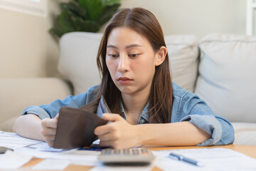 Stressed, Problem business person woman holding and open empty wallet, purse no have money for bill payment, credit card loan or expense. Bankruptcy, bankrupt or debt financial, mortgage concept.