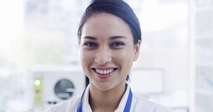Portrait of happy doctor or scientist smile in a medical research laboratory while working in the science industry. Woman medicine healthcare worker or employee happiness with career and job success
