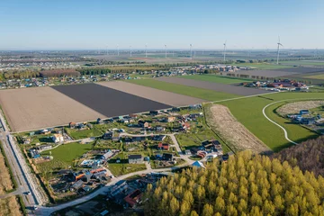 Foto auf Leinwand New rural neighbourhood Hout in Almere, The Netherlands, surrounded by nature. Aerial view. © Pavlo Glazkov