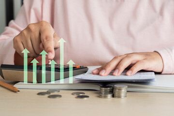 Woman doing home accounting calculating book bank statement with business graph icon
