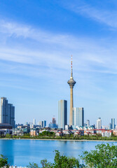 Obraz premium Buildings under blue sky and white clouds