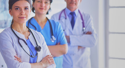 Fototapeta premium Group of doctors and nurses standing in the hospital Accident and Emergency department