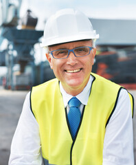 Construction worker, engineer or logistics manager portrait at a shipping warehouse for...