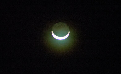 Obraz premium The Moon is Earth's only natural satellite. Together with Earth it forms the Earth-Moon satellite system. In Solar System it is the fifth largest satellite & about one-quarter of Earth in diameter.