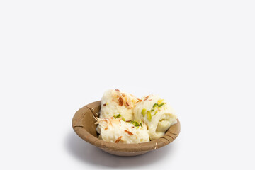 Indian Mithai Bread Malai Roll Rabdi Or Bengali Rabri Is Made Of Soft White Bread Slices, Dipped Soaked Or Dunked In Simmering Creamy Milk With Kesar, Khoya, Mawa, Mava, Khoa, Pista, Badam, Kaju
