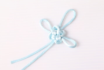Fototapeta na wymiar Blue Chinese decorative knots on white background