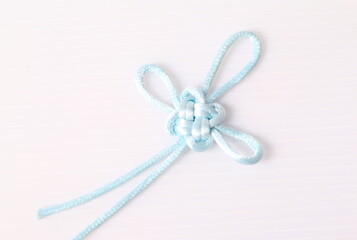 Blue Chinese decorative knots on white background