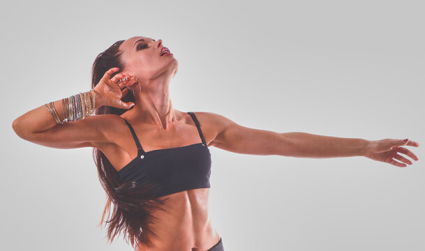 Stylish and young modern style dancer is posing